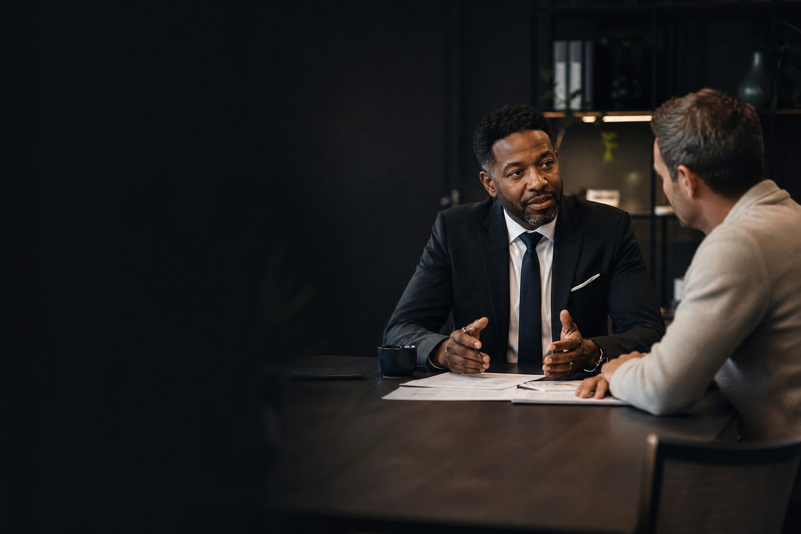 Black financial adviser with contractor client
